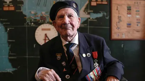 PA Veteran George Chandler in the map room of Southwick House