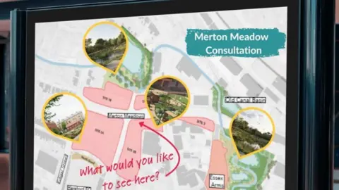A picture of a notice board with a map of Merton Meadow.