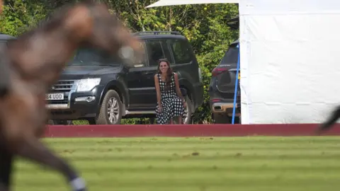 PA Media The Princess of Wales watches as the Prince of Wales takes part in the DMMI Royal Charity Polo Cup 2026 at Guards Polo Club in Windsor Great Park, Berkshire.
