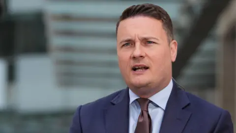 Health Secretary Wes Streeting stands outside BBC Broadcasting House in London