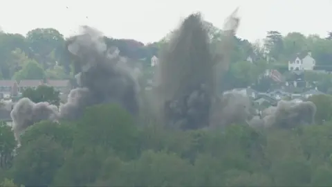 Smoke and debris from exploded bomb
