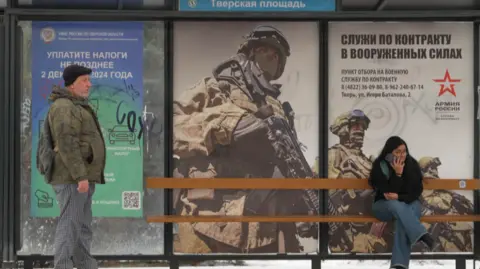 BBC A recruitment poster at a bus stop