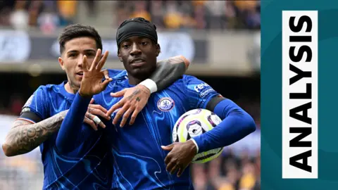 Noni Madueke celebrates scoring a hat-trick