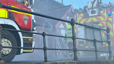 Paul Waugh Smoke near the cliff