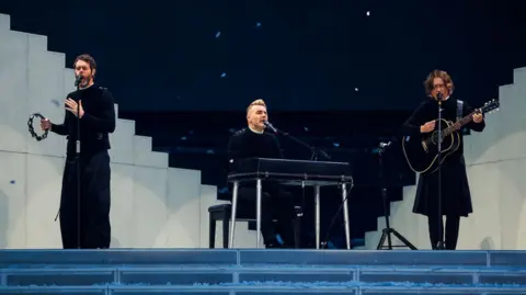 Rogan Thomson/Ashton Gate Stadium Gary Barlow and other members of Take That on stage at Ashton Gate in Bristol