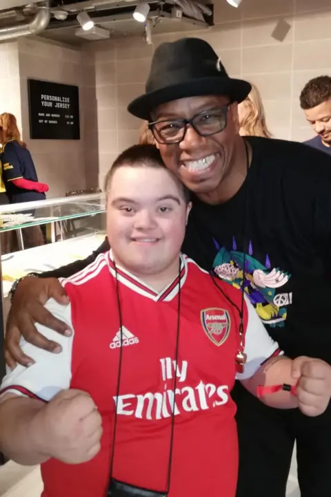 Krome 21 CIC Ian Wright hugging one of the North London United players