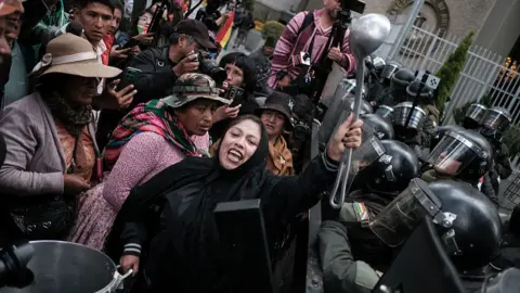 Women from various social sectors participate in a Mother's Day protest in Bolivia, demanding the resignation of Bolivian President Rodrigo Paz in La Paz, Bolivia.
