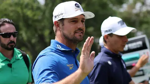 Bryson DeChambeau waves to the crowd during day one of LIV Golf Mexico City at Club de Golf Chapultepec