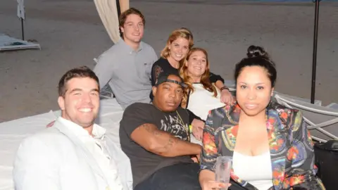 Getty Images Ja Rule, Billy McFarland and others in a 2014 photo