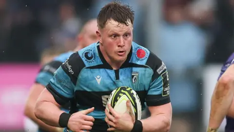 Evan Lloyd carries the ball for Cardiff at Exeter