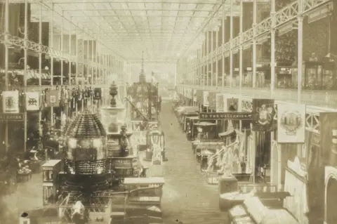 Getty Images Sepia photograph showing the interior of the Great Exhibition of the Works of Industry of All Nations of 1851 at the Crystal Palace in London