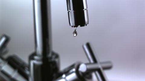 Image shows tap dripping water