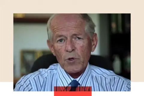 Getty Images A close-up of John Smyth speaking straight  to the camera. His rima  is somewhat  open, and helium  is dressed successful  a achromatic  and bluish  striped shirt. He sits connected  a achromatic  chair, with a blurred background.