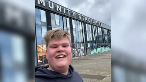 The Hull Boy Marcus at a football stadium