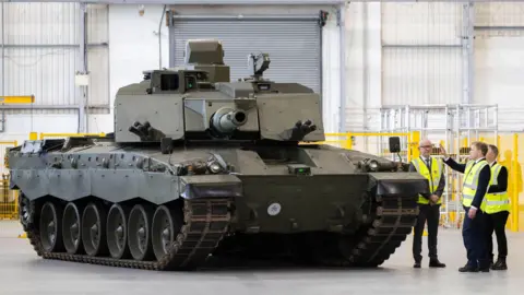 Ministry of Defence Grant Shapps visits a tank factory production line