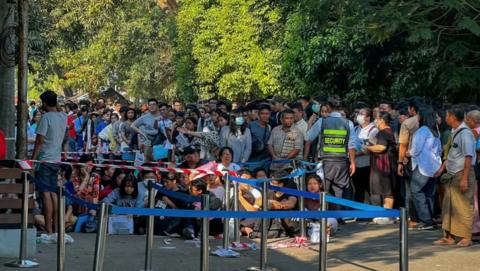 People desperate to get visas seen outside the Thai embassy in Yangon in February