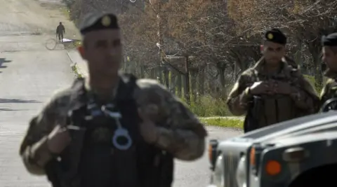 Lebanese soldiers at a blocked road leading to the village of Kfarkela (18/02/25)