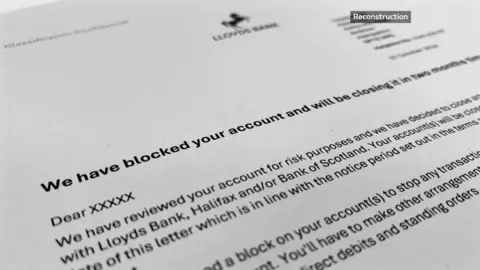 A mock up of a letter from Lloyds Bank with the words 'We have blocked your account and will be closing it in two months time'.