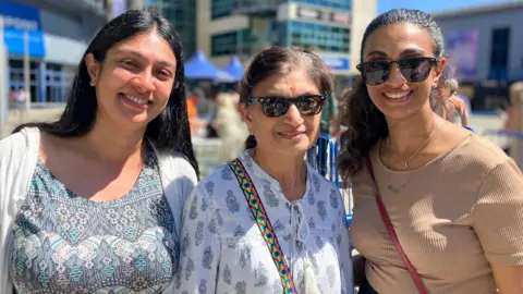 Left to right are pictured Kiran Soni, Usha Soni and Ashni Soni in the sunshine