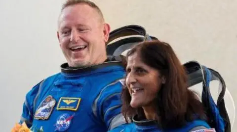 Reuters Barry Wilmore and Sunita Williams