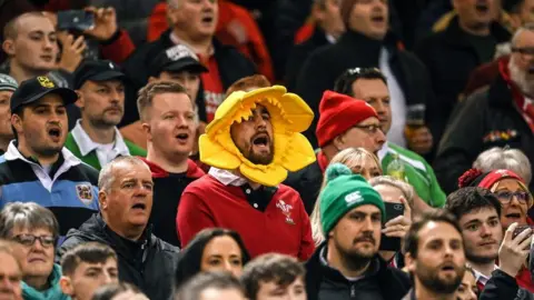 Brendan Moran/Getty Image Wales supporters during the national anthems before the Guinness Six Nations Rugby Championship match between Wales and Ireland at Principality Stadium in Cardiff, Wales.