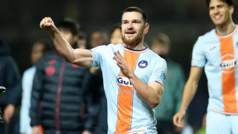 Zan Vipotnik celebrates after victory at Oxford 