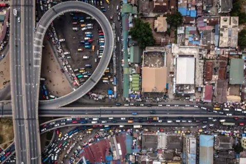 AFP This aerial view shows the Kwame Nkrumah Circle neighbourhood in Accra on 3 December 2024