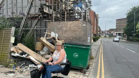 Tony Fisher/BBC Lynda Bell near scaffolding