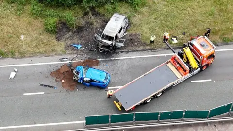 BBC Two vehicles in the road after a crash