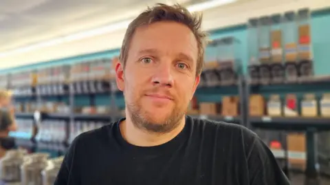 Paul Moseley/BBC Graham Rutherford in his shop