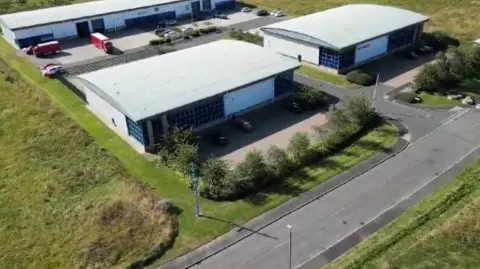 Liz Naylor  An aerial view of a large industrial unit 