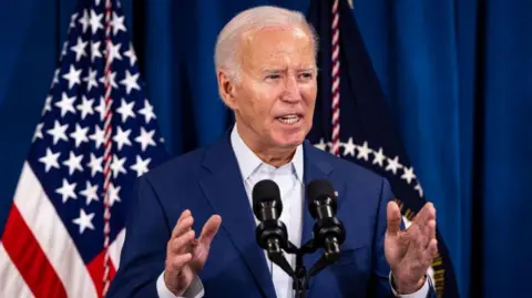 Getty Images US President Joe Biden speaks after his Republican rival Donald Trump was injured in a shooting at a campaign rally in Pennsylvania