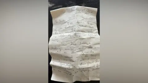 Brendon Swallow A letter written on crumpled paper in pencil.