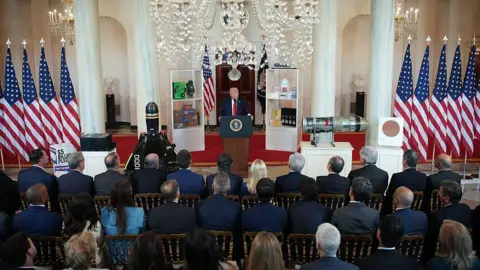 Getty Images US President Donald Trump speaks in the Cross Hall of the White House during an event on "Investing in America" on April 30, 2025 in Washington, DC. Trump was joined by CEOs to highlight their companies during the event. 