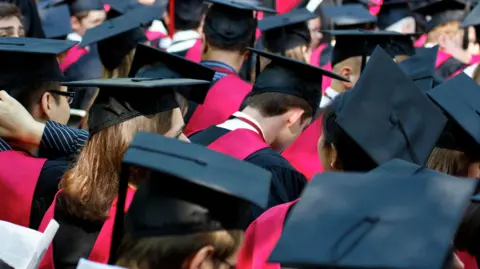 Students at a graduation ceremony