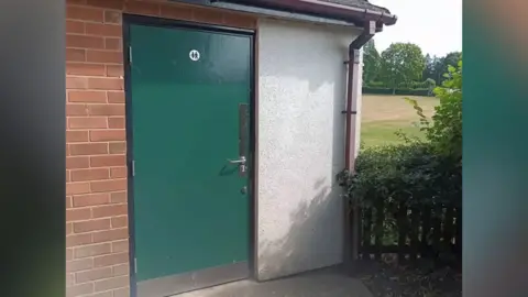 A toilet block in a park