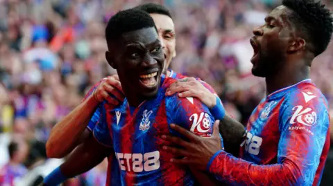 Crystal Palace players celebrate scoring against Aston Villa in the FA Cup semi-final at Wembley