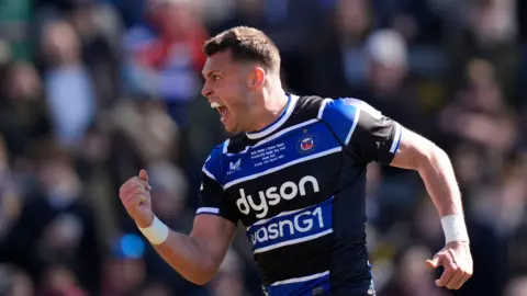 PA Media Bath Rugby's Tom Carr Smith celebrates after scoring a try 