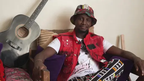 Kenyan Oasis fans Jeff Gachini