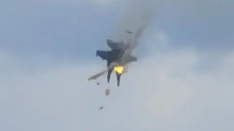 Two fighter jets collide mid-air