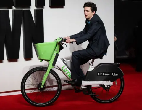 Getty Images Timothée Chalamet arrives on a Lime Bike as he attends the UK Premiere of "A Complete Unknown" at the BFI Southbank on January 14, 2025 in London, England