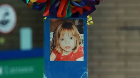 A poster of Madeleine McCann outside Glenfield Hospital in November 2007