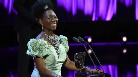 Getty Images  Baroness Floella Benjamin accepts the Fellowship Award onstage during the 2024 BAFTA Television Awards with P&O Cruises at The Royal Festival Hall on May 12, 2024 in London, England.