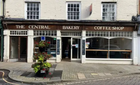 The site of Central Bakery in Leominster, pictured with the door open