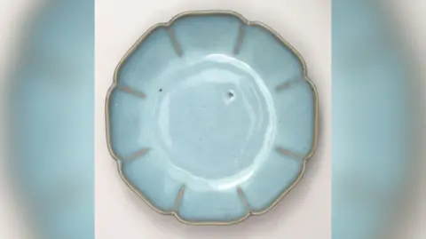 PA Media Blue plate with petal-like edges