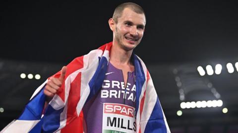George Mills celebrates winning European 5,000m silver