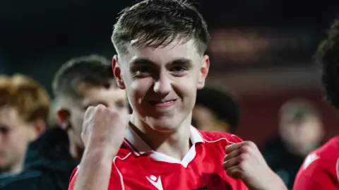 Dafydd Edwards celebrates a Wrexham victory