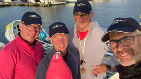 The Lessons from a Boat Team (left to right): Jason Howard, Dan Dicker, Steve Potter, Jon Wilburn