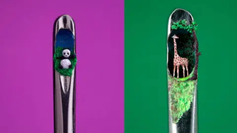 David A Lindon Side-by-side images of two needle eyes with David Lindon's artwork inside. The image on the left shows a black and white panda resting in some greenery with a blue background. The image on the right shows a Giraffe with a forest background.