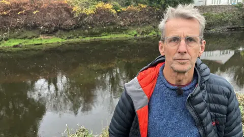 Campaigner Ric Cooper stands by the River Cleddau